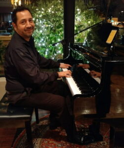 Paul Reekie at piano